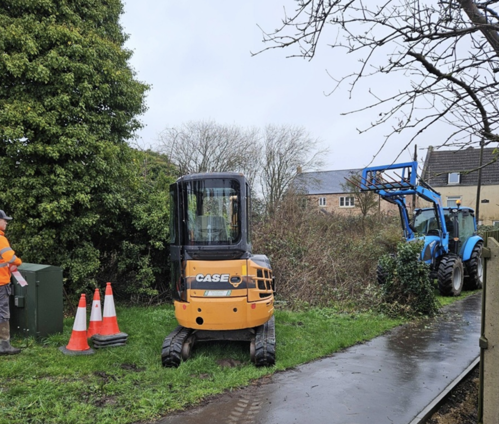 Tractors clearing the weeds and brambles from the Old Sluice area.